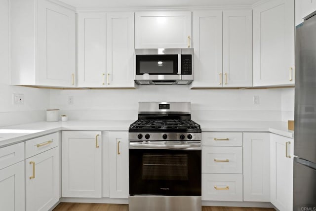 2858 Lehigh Ct, Oceanside, CA 92056 - kitchen with stainless steel appliances, white cabinets, and light countertops