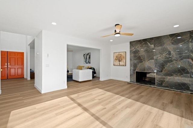 2858 Lehigh Ct, Oceanside, CA 92056 - unfurnished living room with wood finished floors, ceiling fan, baseboards, recessed lighting, and a fireplace