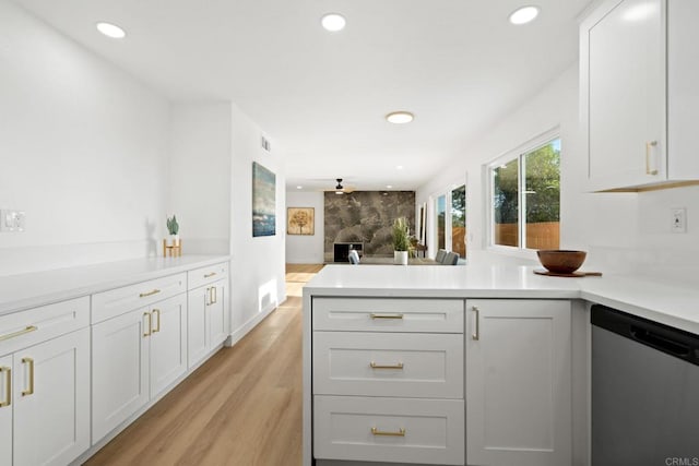 2858 Lehigh Ct, Oceanside, CA 92056 - kitchen featuring dishwasher, a peninsula, recessed lighting, light countertops, and open floor plan