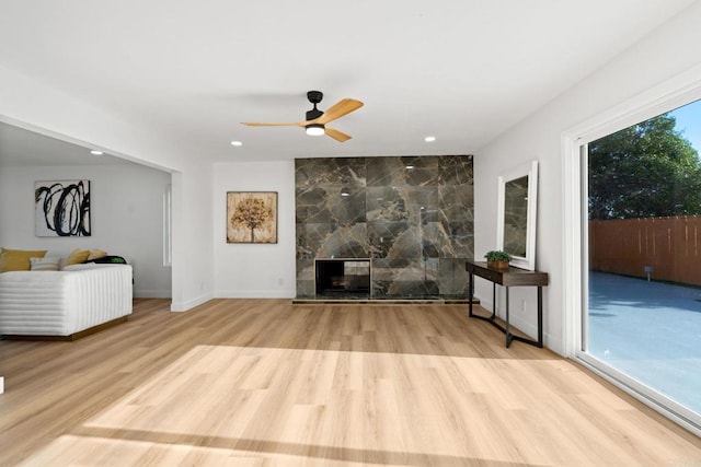 2858 Lehigh Ct, Oceanside, CA 92056 - living room featuring wood finished floors, ceiling fan, recessed lighting, a fireplace, and baseboards