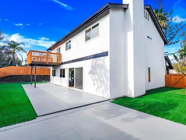2858 Lehigh Ct, Oceanside, CA 92056 - back of property with a patio, a wooden deck, and stucco siding