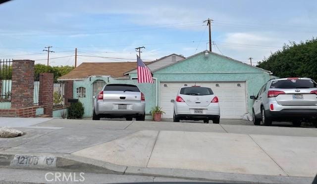 12108 Springview Dr, Whittier, CA 90604 - exterior space featuring driveway and an attached garage