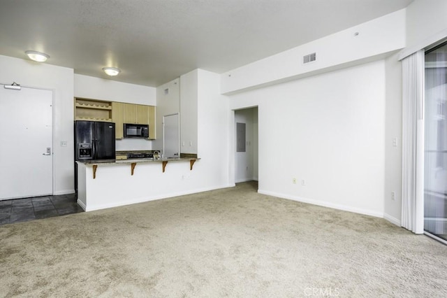 388 E Ocean Blvd Unit 1401, Long Beach, CA 90802 - unfurnished living room featuring dark carpet and baseboards