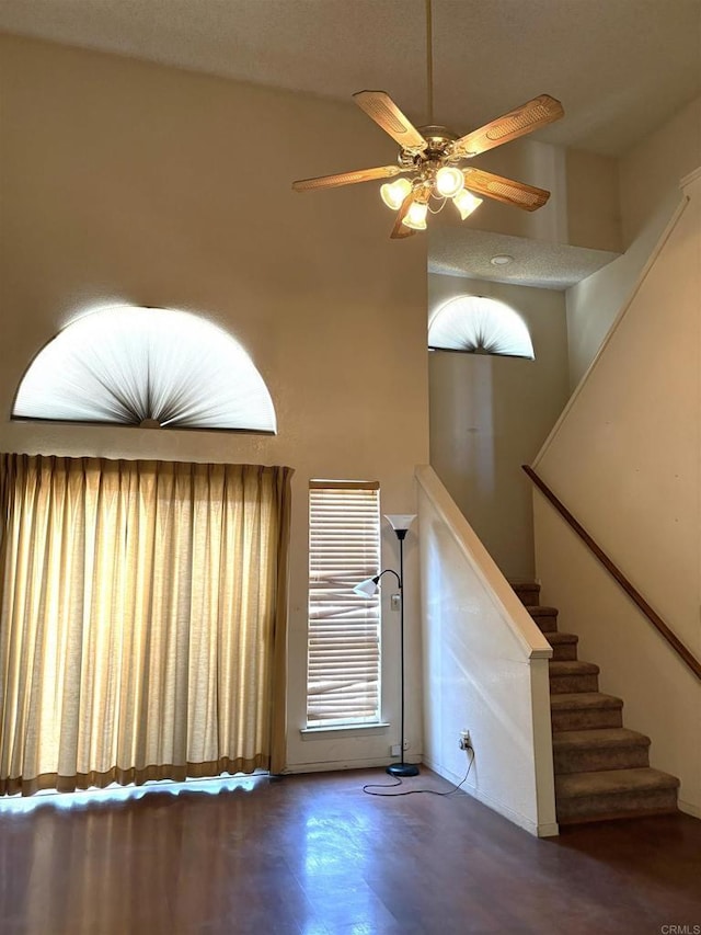 6049 N Constance Ave, Fresno, CA 93722 - staircase featuring wood finished floors and ceiling fan