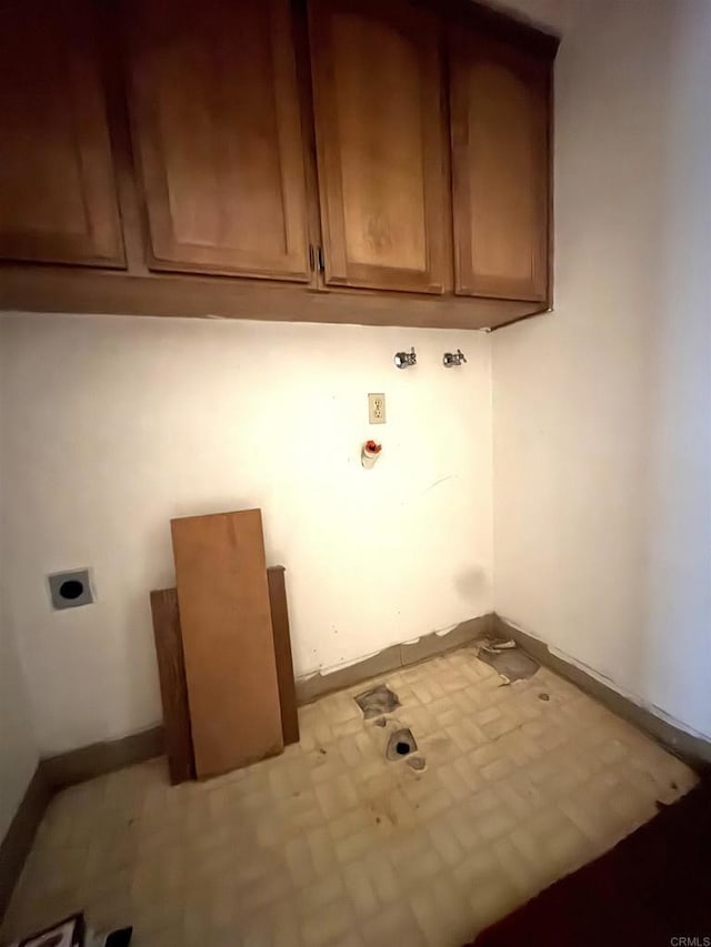 6049 N Constance Ave, Fresno, CA 93722 - washroom with hookup for an electric dryer and cabinet space