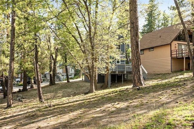 33133 Ridge Rd, Arrowbear, CA 92382 - view of yard featuring a deck