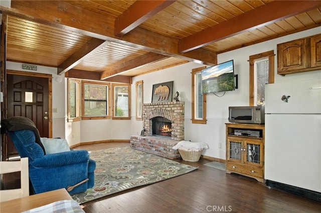 33133 Ridge Rd, Arrowbear, CA 92382 - living room with baseboards, wood ceiling with exposed beams, wood finished floors, and a fireplace