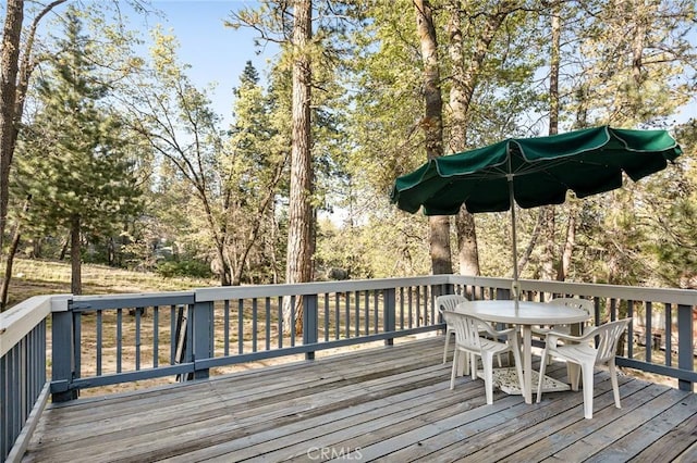 33133 Ridge Rd, Arrowbear, CA 92382 - wooden terrace featuring outdoor dining space