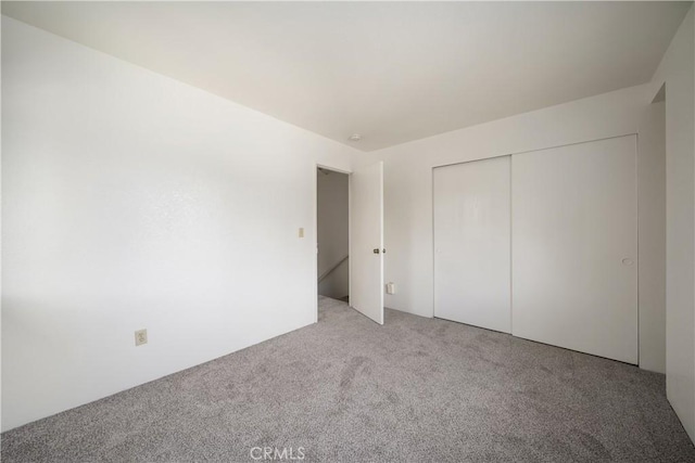 2975 Rockview Pl # 2, San Luis Obispo, CA 93401 - unfurnished bedroom with light carpet and a closet