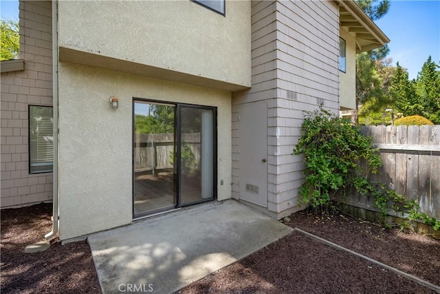 2975 Rockview Pl # 2, San Luis Obispo, CA 93401 - doorway to property featuring stucco siding