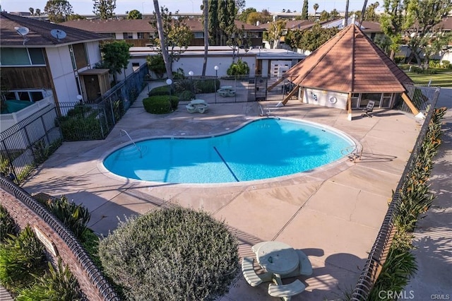 15500 Tustin Village Way Unit 28, Tustin, CA 92780 - community pool with a patio and a residential view