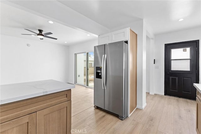 15447 Romar St, Mission Hills San Fernando, CA 91345 - kitchen with stainless steel fridge, light wood finished floors, a ceiling fan, recessed lighting, and light stone countertops