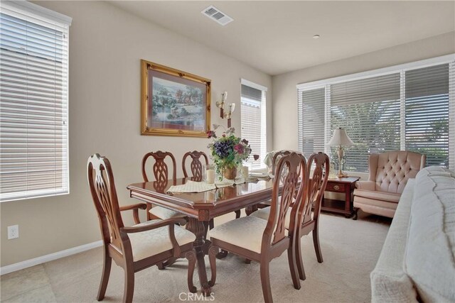 11156 Camden St, Apple Valley, CA 92308 - dining area with plenty of natural light, light carpet, and baseboards