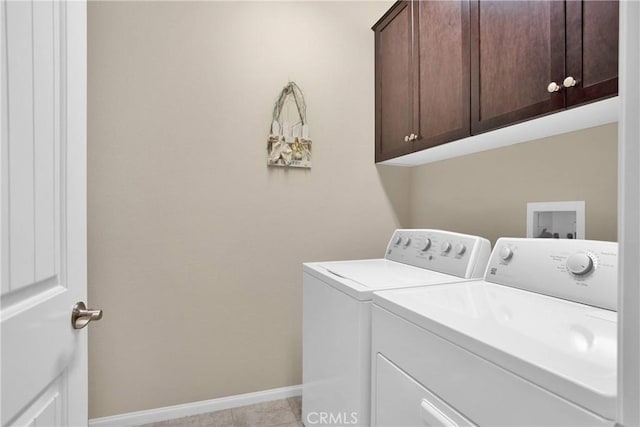 11156 Camden St, Apple Valley, CA 92308 - washroom with cabinet space, washing machine and clothes dryer, baseboards, and light tile patterned floors