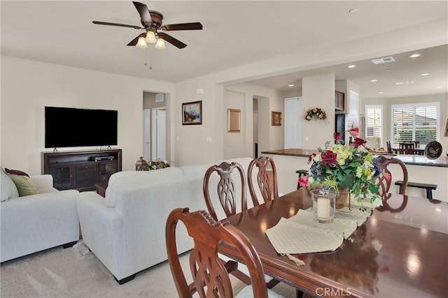 11156 Camden St, Apple Valley, CA 92308 - dining room featuring ceiling fan, light colored carpet, and recessed lighting