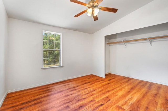 133 Frances Dr, El Cajon, CA 92019 - unfurnished bedroom with a closet, vaulted ceiling, light wood-style flooring, baseboards, and a ceiling fan