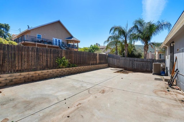 133 Frances Dr, El Cajon, CA 92019 - fenced backyard featuring central AC unit and a patio area