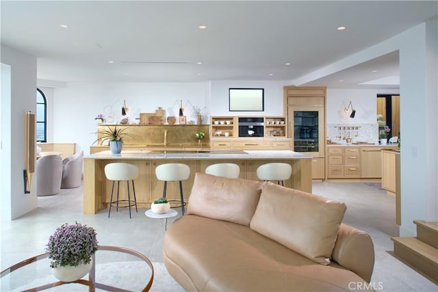 17 Muir Beach Cir, Corona Del Mar, CA 92625 - kitchen featuring open floor plan, recessed lighting, light brown cabinetry, decorative backsplash, and wall oven