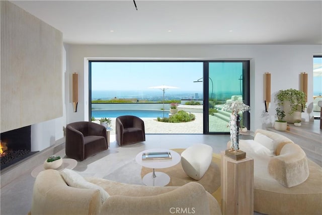 17 Muir Beach Cir, Corona Del Mar, CA 92625 - living room featuring a high end fireplace and a water view
