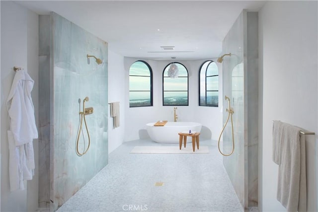 17 Muir Beach Cir, Corona Del Mar, CA 92625 - bathroom with a marble finish shower and a soaking tub