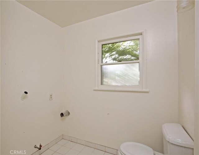 7228 Bairnsdale St, Downey, CA 90240 - bathroom featuring toilet, baseboards, and tile patterned flooring