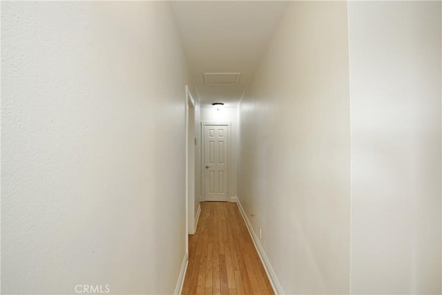 7228 Bairnsdale St, Downey, CA 90240 - corridor with light wood-style floors and baseboards