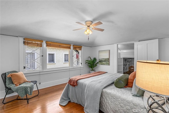 4039 W 7th St, Los Angeles, CA 90005 - bedroom featuring wood finished floors, baseboards, and a ceiling fan