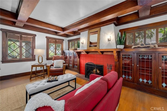 4039 W 7th St, Los Angeles, CA 90005 - living area featuring healthy amount of natural light, coffered ceiling, baseboards, wood finished floors, and a fireplace