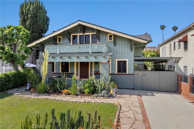 4039 W 7th St, Los Angeles, CA 90005 - view of front of home featuring board and batten siding, a balcony, and a porch