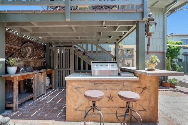 4039 W 7th St, Los Angeles, CA 90005 - view of patio featuring an outdoor bar and stairway