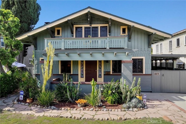 4039 W 7th St, Los Angeles, CA 90005 - view of front of house featuring a balcony, a porch, and board and batten siding