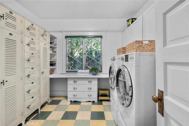 4039 W 7th St, Los Angeles, CA 90005 - laundry area featuring cabinet space, washer and clothes dryer, and light floors
