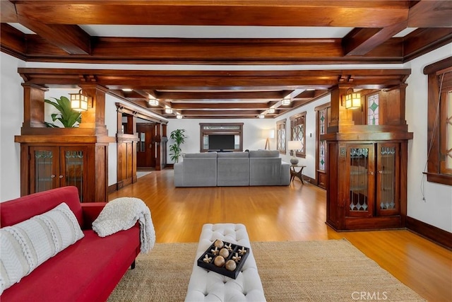 4039 W 7th St, Los Angeles, CA 90005 - living room with wood finished floors, baseboards, and beamed ceiling