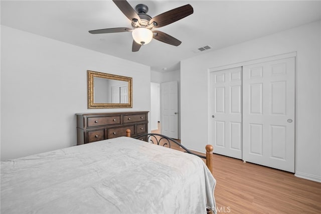 11757 Stonefield Dr, Corona, CA 92883 - bedroom with light wood-type flooring, a closet, ceiling fan, and baseboards
