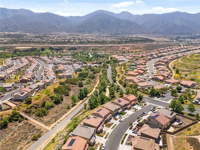 11757 Stonefield Dr, Corona, CA 92883 - aerial view of property and surrounding area featuring nearby suburban area and a mountainous background