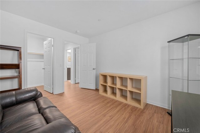 11757 Stonefield Dr, Corona, CA 92883 - living room featuring light wood-type flooring and baseboards