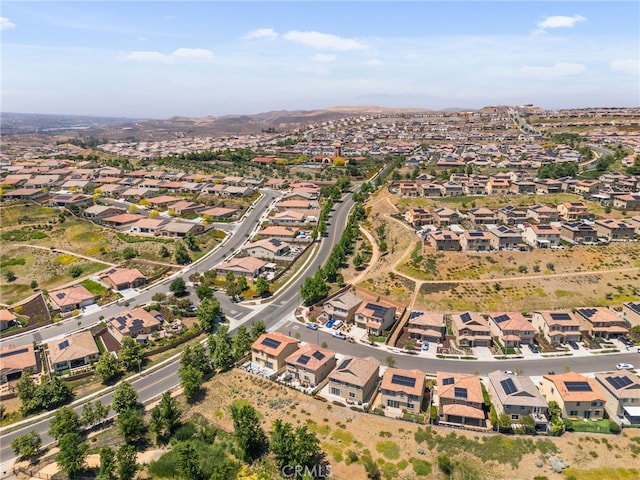 11757 Stonefield Dr, Corona, CA 92883 - aerial view of property and surrounding area featuring nearby suburban area and a mountainous background