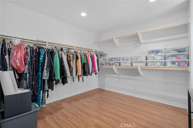 11757 Stonefield Dr, Corona, CA 92883 - walk in closet with wood finished floors