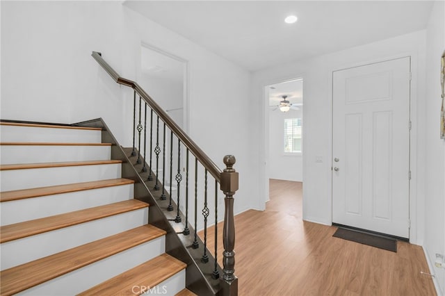 11757 Stonefield Dr, Corona, CA 92883 - entryway featuring light wood finished floors, ceiling fan, recessed lighting, baseboards, and stairs