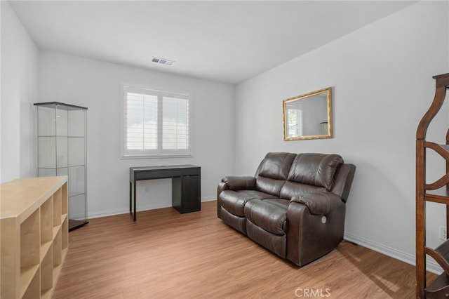 11757 Stonefield Dr, Corona, CA 92883 - living area with light wood-style floors and baseboards