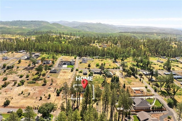 5863 Kibler Rd, Paradise, CA 95969 - view of property location with a mountainous background and a forest