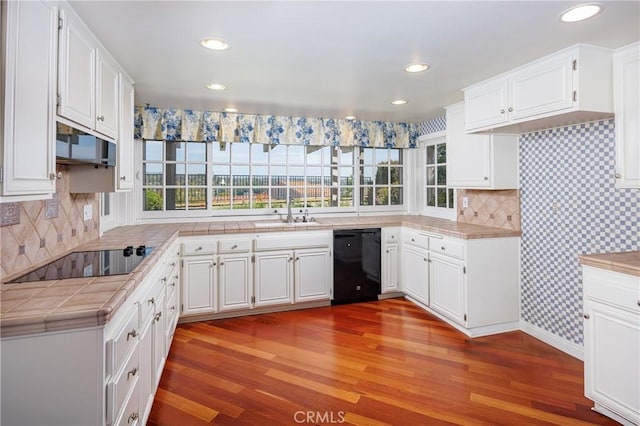 23552 Campestre, Mission Viejo, CA 92691 - kitchen with black appliances, a sink, tile counters, wood finished floors, and recessed lighting
