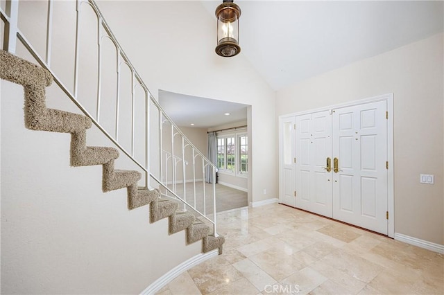 23552 Campestre, Mission Viejo, CA 92691 - entrance foyer featuring stairway, baseboards, and high vaulted ceiling