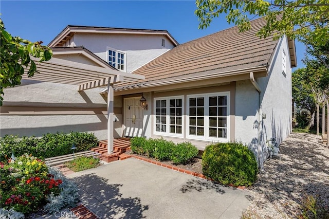 23552 Campestre, Mission Viejo, CA 92691 - view of front of home featuring stucco siding, a patio area, and a pergola