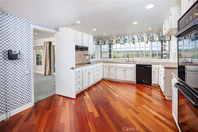 23552 Campestre, Mission Viejo, CA 92691 - kitchen featuring black appliances, wood finished floors, healthy amount of natural light, white cabinets, and recessed lighting