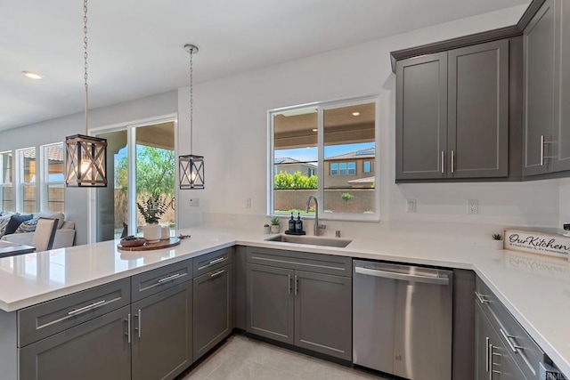 35404 Domani Dr, Palm Desert, CA 92211 - kitchen with dishwasher, gray cabinetry, light countertops, and a peninsula