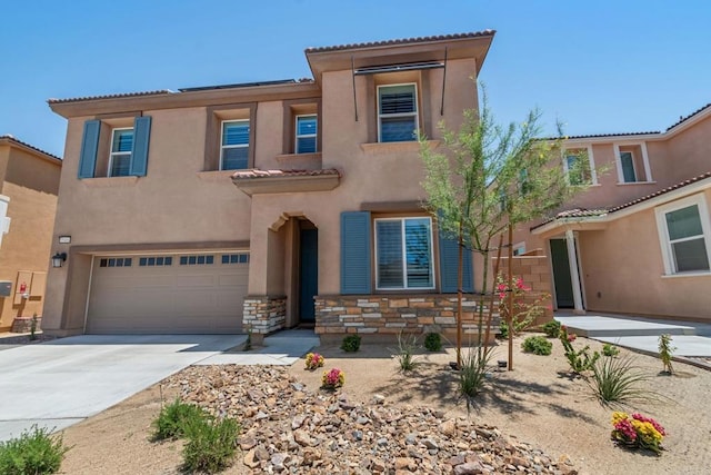 35404 Domani Dr, Palm Desert, CA 92211 - view of front facade featuring stucco siding, an attached garage, concrete driveway, a tile roof, and stone siding