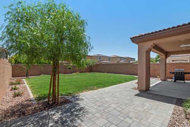 35404 Domani Dr, Palm Desert, CA 92211 - fenced backyard featuring a patio and a grill