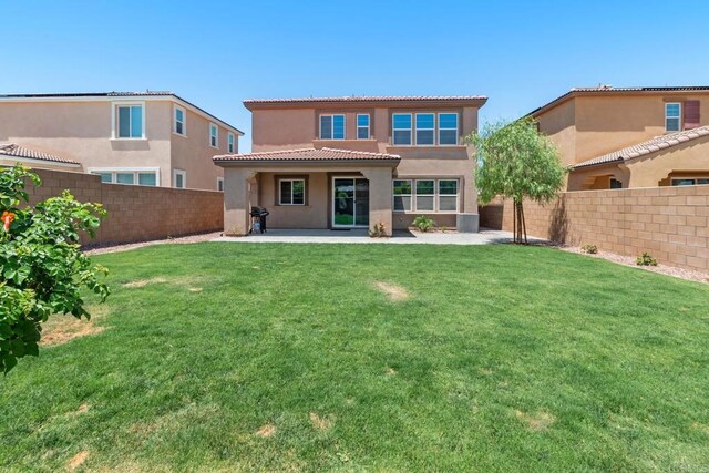 35404 Domani Dr, Palm Desert, CA 92211 - back of property featuring stucco siding, a fenced backyard, a patio, and a tiled roof