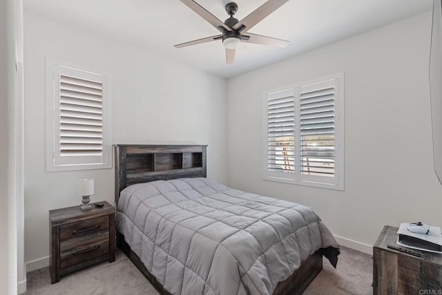 35404 Domani Dr, Palm Desert, CA 92211 - bedroom with light colored carpet and a ceiling fan